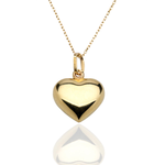 Złoty naszyjnik z zawieszką w kształcie serca.